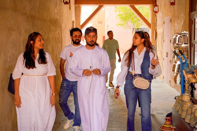 Dubai: Old Town, Souks, Street Food, Guided Tour & Abra Ride - Walking Through Al Fahidi: What to Look For in the Narrow Lanes