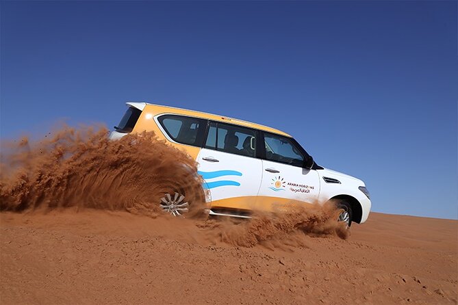 Dubai Premium Desert Safari with Live shows & Gourmet Dinner - Dune bashing (about 30 minutes) and sand boarding: fun with a safety mindset