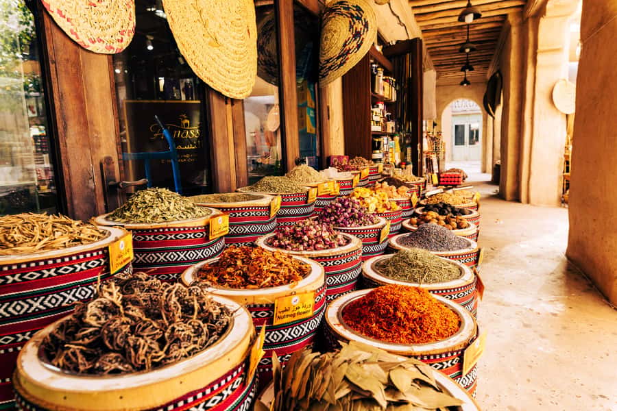 Dubai: Premium Old Town, Street Food, Souks & Boat Ride Tour - Al Seef and Dubai Creek shoreline views: old Dubai with a modern edge