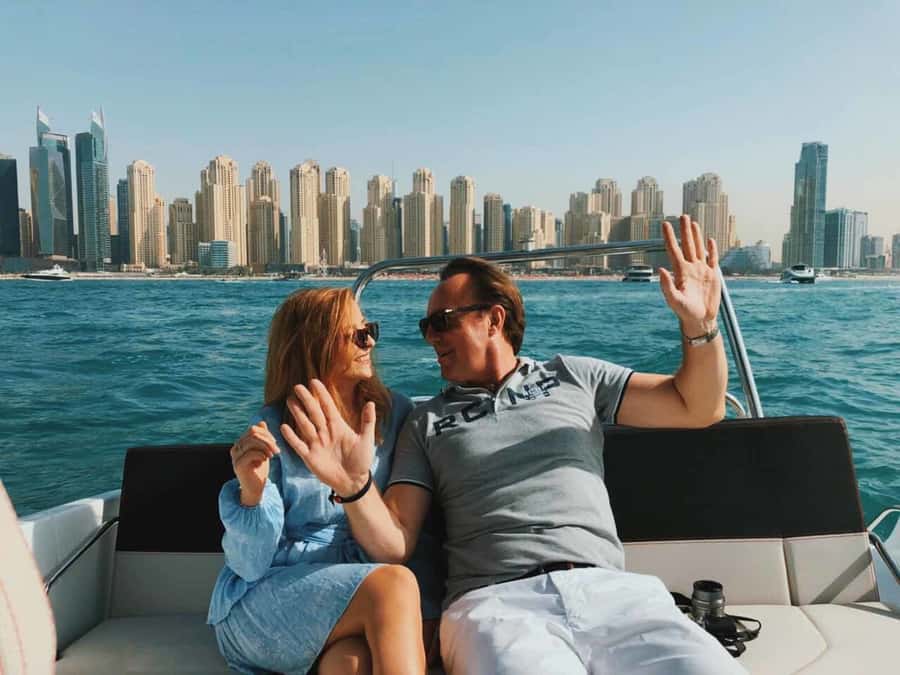 Dubai: Private Sea Escape Cruise - Swim, Tan & Sightsee - What You Can Do On Board: Music, Sunbeds, and Photo Opportunities