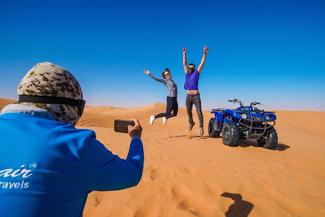 Dubai Red Dunes ATV, Camels, Stargazing & 5<em> BBQ Al Khayma Camp – Key Things to Know Before You Go’ /></p>
<ul>
<li><strong>Real 60-minute quad/ATV session</strong> on Lahbab red dunes, with a helmet and safety briefing</li>
<li><strong>Pickup and drop-off included</strong>, with an air-conditioned vehicle and camp transfers</li>
<li><strong>Small-group feel</strong> with a maximum of 15 travelers</li>
<li><strong>Al Khayma “elite” camp activities included</strong>: camel ride, henna (women), shisha, falcon photos, sweets/coffee</li>
<li><strong>Evening adds stargazing and the fire show</strong>, while earlier slots skip those parts</li>
<li><strong>ATV rules are serious</strong>: you’re responsible for your quad and any damage you cause</li>
</ul>
<h2 id="atv-power-on-lahbab-red-dunes-what-makes-this-feel-worth-it">ATV Power on Lahbab Red Dunes: what makes this feel worth it</h2>
<p> BBQ Al Khayma Camp – ATV Power on Lahbab Red Dunes: what makes this feel worth it’ /><br />
This is the type of Dubai desert safari that actually starts with the point. You’re heading to the Lahbab desert, famous for red-orange dunes that look great in photos and feel different under your tires than the flatter sand near some other spots.</p>
<p><p>The quad portion is the headline: after pickup, you’ll gear up with a helmet and get a safety talk from your instructor. Then you’ll ride for about an hour, following the guide over sandbanks and dune tracks. The best part is that you’re not just driving in circles. You stop for photos, and sandboarding is built into the same block of action, so you get multiple “I’m doing this in Dubai” moments instead of one long ride with nothing else.</p>
</p>
<p><p>A practical note: the tour is built for people who can handle basic driving. You must have basic driving knowledge, and you need to be at least 14 to ride. If you’re sharing an ATV, the sharing-bike option requires at least two passengers, or you may pay an additional charge if the group doesn’t work out to pairs.</p>
</p>
<div style="margin: 20px 0; padding: 15px 0;"><p>You can also read our reviews of more tours and experiences in Dubai.</p><ul style="margin: 10px 0; padding: 0; list-style: none;"><li style="margin: 0 0 10px 0; padding: 0 0 10px 0; border-bottom: 1px solid #eee; display: flex; align-items: flex-start; gap: 12px; line-height: 1.4;"><a href="https://travellersdestinationguide.com/dubai-burj-khalifa-levels-124-125-entry-ticket-options/" aria-hidden="true" tabindex="-1"><img decoding="async" style="width: 80px; height: 60px; object-fit: cover; border-radius: 4px; flex-shrink: 0;" src="https://7.travellersdestinationguide.com/wp-content/uploads/dubai-burj-khalifa-levels-124-125-entry-ticket-options-150x150.jpg" alt="" loading="lazy"></a><div><a href="https://travellersdestinationguide.com/dubai-burj-khalifa-levels-124-125-entry-ticket-options/">Dubai: Burj Khalifa Levels 124 & 125 Entry Ticket + Options</a><br><span style="font-size: 0.82em; color: #555; margin-top: 2px;"><span style="color: #f5a623;">★</span> 4.3 &middot; 90,891 reviews</span></div></li><li style="margin: 0 0 10px 0; padding: 0 0 10px 0; border-bottom: 1px solid #eee; display: flex; align-items: flex-start; gap: 12px; line-height: 1.4;"><a href="https://travellersdestinationguide.com/dubai-desert-safari-quad-bike-camel-ride-al-khayma-camp/" aria-hidden="true" tabindex="-1"><img decoding="async" style="width: 80px; height: 60px; object-fit: cover; border-radius: 4px; flex-shrink: 0;" src="https://7.travellersdestinationguide.com/wp-content/uploads/dubai-desert-safari-quad-bike-camel-ride-al-khayma-camp-150x150.jpg" alt="" loading="lazy"></a><div><a href="https://travellersdestinationguide.com/dubai-desert-safari-quad-bike-camel-ride-al-khayma-camp/">Dubai: Desert Safari, Quad Bike, Camel Ride & Al Khayma Camp</a><br><span style="font-size: 0.82em; color: #555; margin-top: 2px;"><span style="color: #f5a623;">★</span> 4.9 &middot; 68,962 reviews</span></div></li><li style="margin: 0; padding: 0; border-bottom: none; display: flex; align-items: flex-start; gap: 12px; line-height: 1.4;"><a href="https://travellersdestinationguide.com/dubai-desert-safari-quad-bike-camel-ride-and-sandboarding/" aria-hidden="true" tabindex="-1"><img decoding="async" style="width: 80px; height: 60px; object-fit: cover; border-radius: 4px; flex-shrink: 0;" src="https://7.travellersdestinationguide.com/wp-content/uploads/dubai-desert-safari-quad-bike-camel-ride-and-sandboarding-150x150.jpg" alt="" loading="lazy"></a><div><a href="https://travellersdestinationguide.com/dubai-desert-safari-quad-bike-camel-ride-and-sandboarding/">Dubai: Desert Safari, Quad Bike, Camel Ride and Sandboarding</a><br><span style="font-size: 0.82em; color: #555; margin-top: 2px;"><span style="color: #f5a623;">★</span> 4.9 &middot; 43,505 reviews</span></div></li></ul></div><h2 id="pickup-timing-and-how-the-6-hours-actually-lands">Pickup, timing, and how the 6 hours actually lands</h2>
<p><img width="669" height="446" decoding="async" src=
