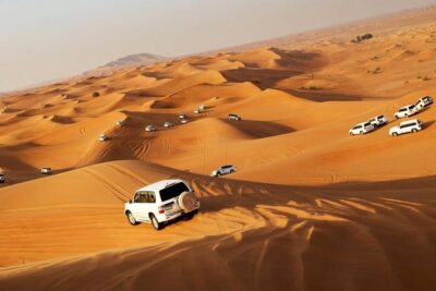 Dubai Red Dunes Desert Safari : Sandboarding, BBQ & Live Shows - The car ride and traditional welcome: your first taste of the desert vibe