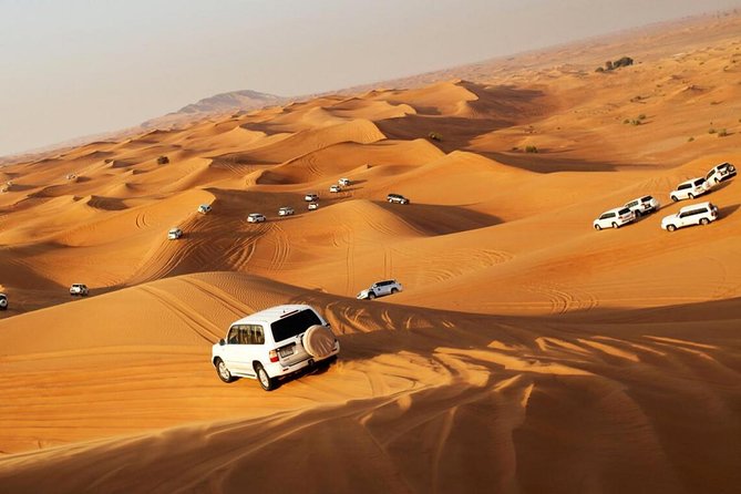 Dubai Red Dunes Desert Safari : Sandboarding, BBQ & Live Shows - The car ride and traditional welcome: your first taste of the desert vibe