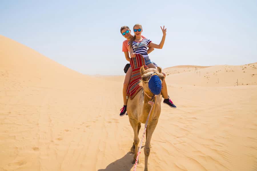 Dubai: Red Dunes Quad Bike with Sandboarding, Camels and BBQ - Quad Biking on the Red Dunes: The Main Event