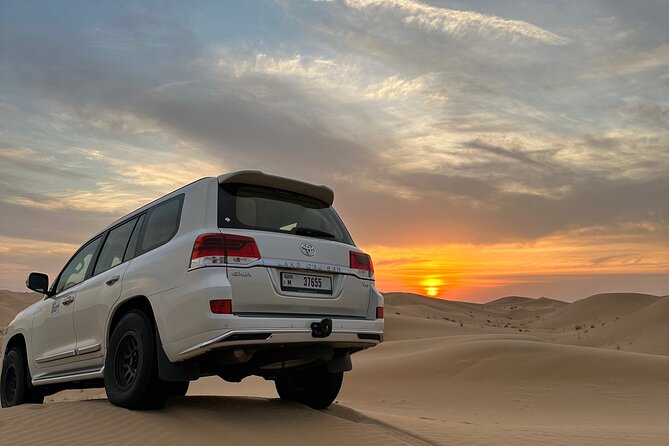 Dubai: Red Dunes, Sandsurf, Camel Ride, BBQ Dinner at Desert Camp - Key highlights at a glance