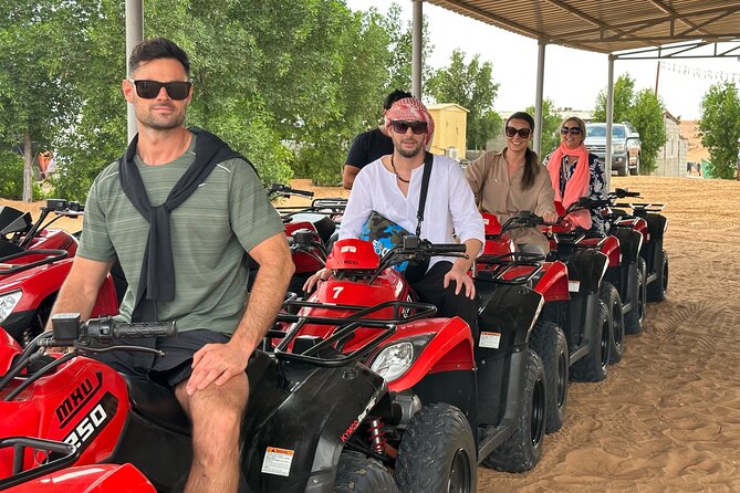 Dubai: Red Dunes, Sandsurf, Camel Ride, BBQ Dinner at Desert Camp - Land Cruiser dune bashing: adrenaline with a motion-travel reality check