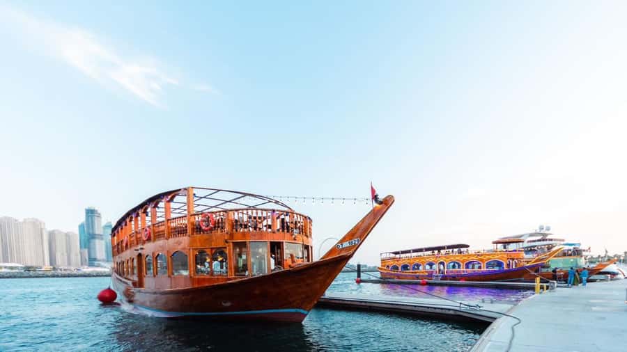 Dubai: Scenic Dhow Cruise with Buffet Dinner and Live Shows - Cruising Dubai Creek on a Traditional Wooden Dhow