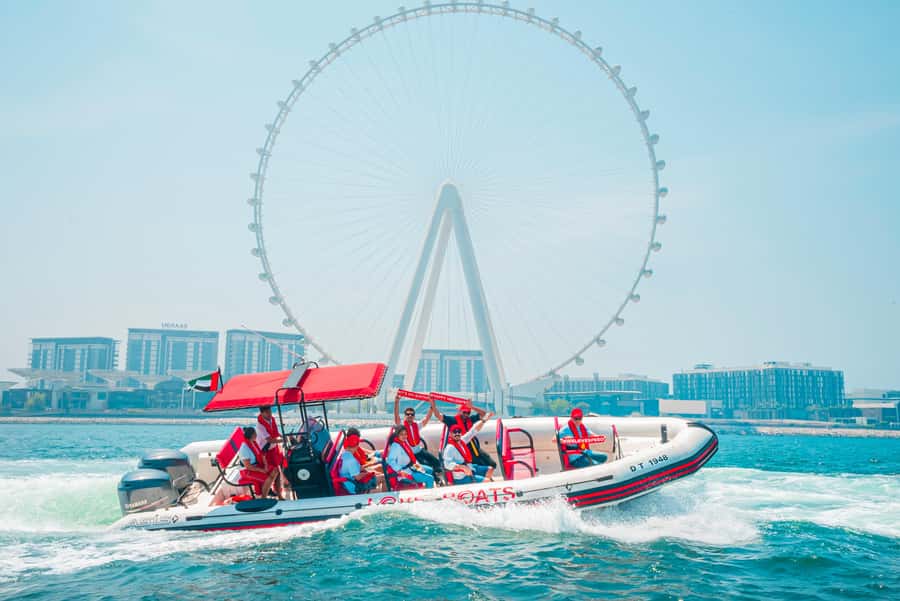Dubai: Sightseeing Speedboat Tour with Live Tour Guide - Bluewater Island and Ain Dubai: the mid-ride payoff