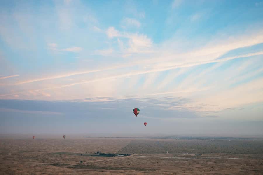 Dubai: Sunrise Hot Air Balloon Tour Over the Desert - Landing and the drive back into the city
