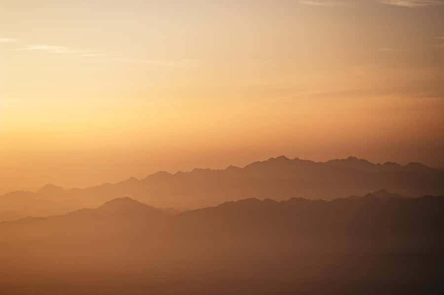 Dubai: Sunrise Hot Air Balloon Tour Over the Desert - Liftoff at dawn: sand dunes, mountains, and looking for wildlife