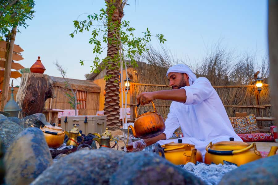 Dubai: Sunset Camel Trek, Al Khayma Camp, Stargazing & BBQ - BBQ dinner and dance shows: getting fed before the stars