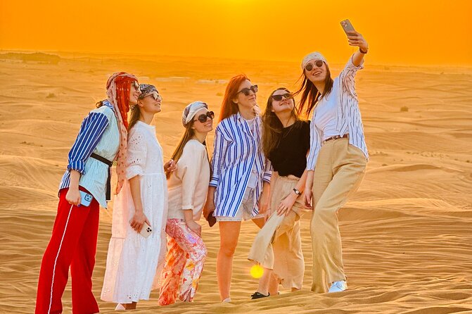 Dubai Sunset Red Dune Desert Safari, Sandboarding and Camel Ride - Dune Bashing on Red Sand: The Main Event
