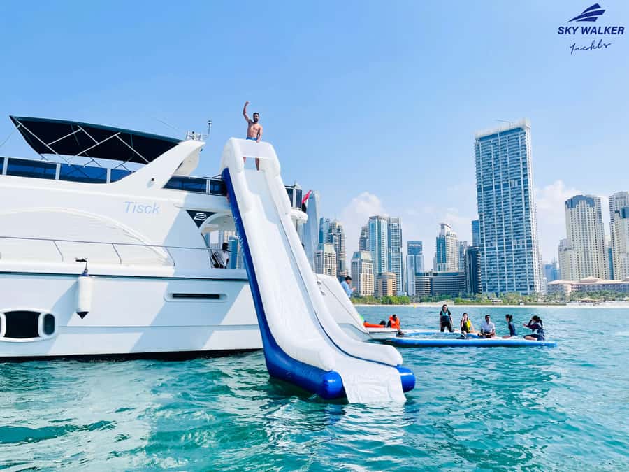 Dubai: Yacht Cruise with Swimming, Snorkeling and BBQ Lunch - Boat comfort you’ll actually feel: pool, sun decks, and inflatable time
