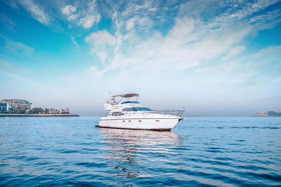 Dubai Yacht Tour - Boat Trip upto 12 guests Private event - Onboard comfort that people actually notice: towels, Wi‑Fi, and the big speaker