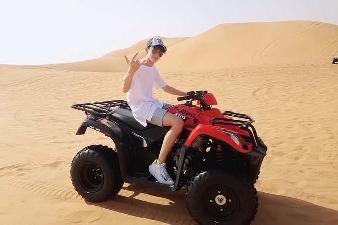 Extreme Quad Driving Adventure Tour - Camel ride and sandboarding: the classic add-ons that round out the morning