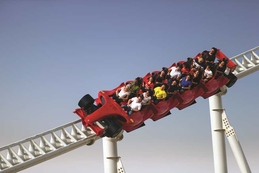 From Dubai: Abu Dhabi Grand Mosque Visit & Theme Park Option - Your add-on choice: Ferrari World, Louvre Abu Dhabi, or Warner Bros