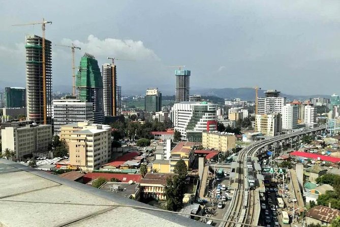 Full Day Tour of Addis Ababa with Hotel Pickup and Drop-off - Chiromeda market pass: optional shopping for local textiles