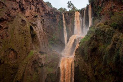 Full Day Trip To Ouzoud Waterfalls From Marrakech & Boat Tour - River crossing and the boat ride near the falls