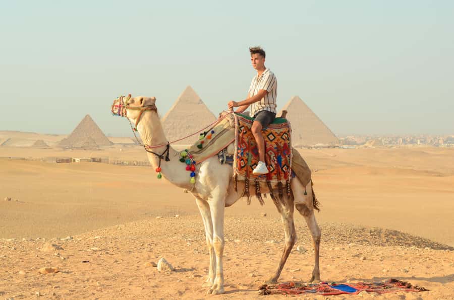 Giza Sunrise Pyramid Guided Tour With Camel Ride & Breakfast - The 2-hour guided Giza walkthrough: Great Pyramids and the Sphinx