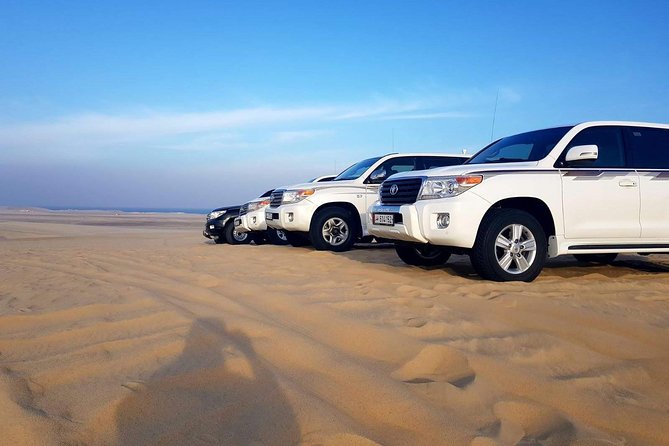 Half Day Desert Safari || Sand Boarding || Camel Ride || Inland Sea Visit || - Sand boarding and camel ride: fun add-ons, but confirm what’s included