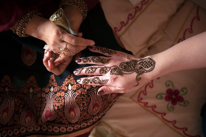 Half-Day Dubai Desert Safari With 7 Live Shows and BBQ Dinner - Bedouin Camp Stops: Henna, Shisha, and Camel Ride