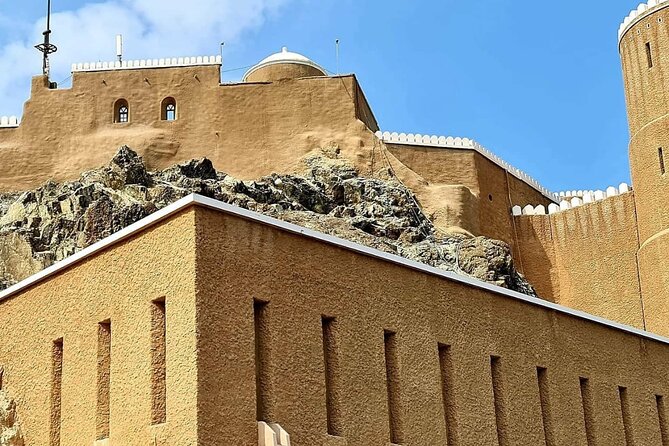 Half-Day Private Muscat City Tour - Top Landmarks in Just 4 Hours - Al Alam Palace and the Portuguese forts: official Muscat meets old-world stone