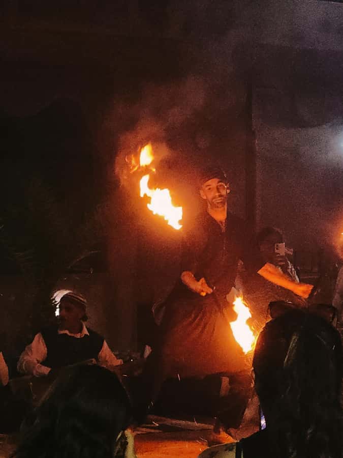 Marrakech: Agafay Camel Ride & Dinner with Fire Show Tour - The 20-Minute Camel Ride Through Agafay’s Rocky Terrain