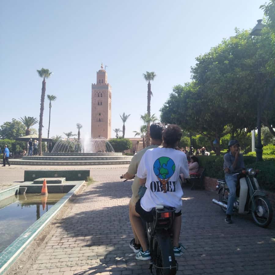 Marrakech: Bicycle Tour with a Local Guide - Koutoubia Mosque and its gardens behind it