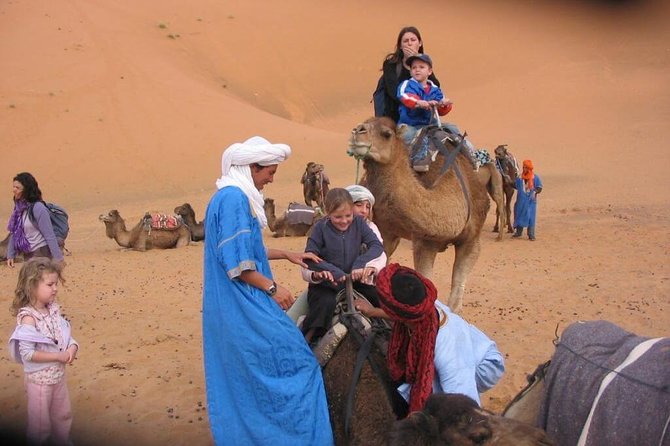 Marrakech Desert: Camel Ride, Quad Biking & Dinner Show Options - Leaving Marrakech in Comfort: Pickup, Air-Conditioned Transport, Quick Escape