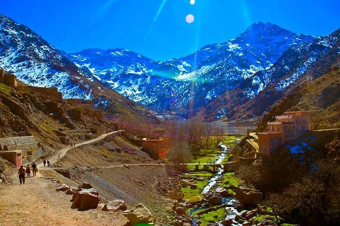 Marrakech High Atlas mountains 3 Valleys waterfalls & Camel Ride - Pickup, timing, and why the private group format matters