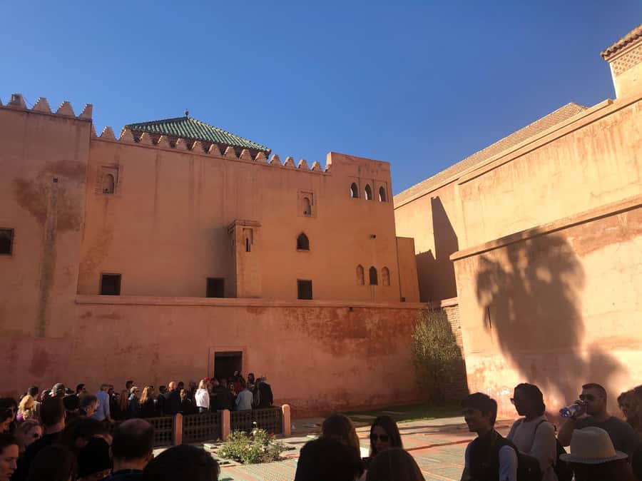 Marrakech: Saadian Tombs, Bahia Palace, Medina and Souk Tour - Pacing, language, and what to bring for the day on foot