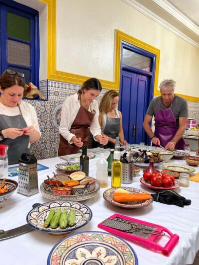 Marrakech: Traditional Moroccan Cooking Class & Market Visit - The riad workshop: Khmisa Workshops and the local women teaching the method