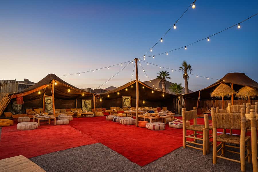 Marrakesh: Agafay Desert Sunset, Camel Ride, and Dinner Show - Sunset at Camp: Colors, Sweets, and the Campfire Build-Up
