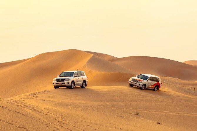 Morning Desert Safari From Abu Dhabi - Camel Farm Visit, Camel Riding, and Sand Boarding at the Camp