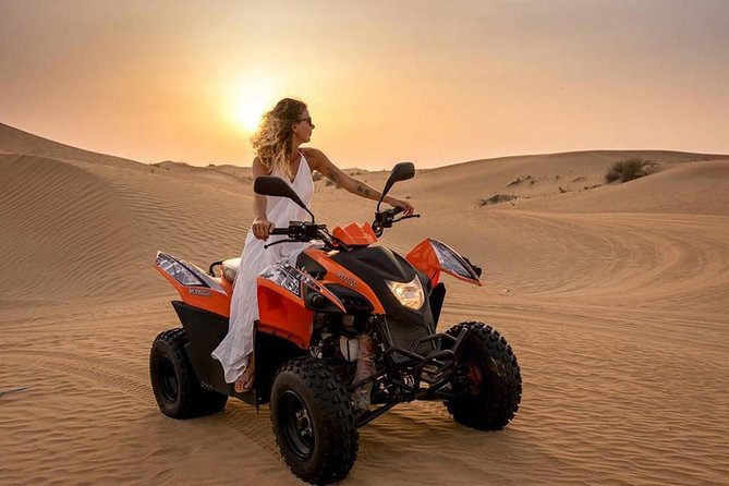 Morning Desert Safari with Quad Bike, Camel Ride & Sandboarding - Dune bashing for 35 to 45 minutes: the adrenaline section