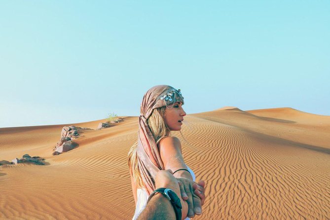 Morning Red Dunes Safari: Camel Ride & Sandboarding Adventure - Lahbab Desert Fun: The 40-Minute Dune Bashing That People Talk About