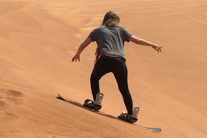 Morning Red Dunes with Camel Ride, Sandboarding and Refreshments - Sandboarding Done Right: Instructions Before You Slide