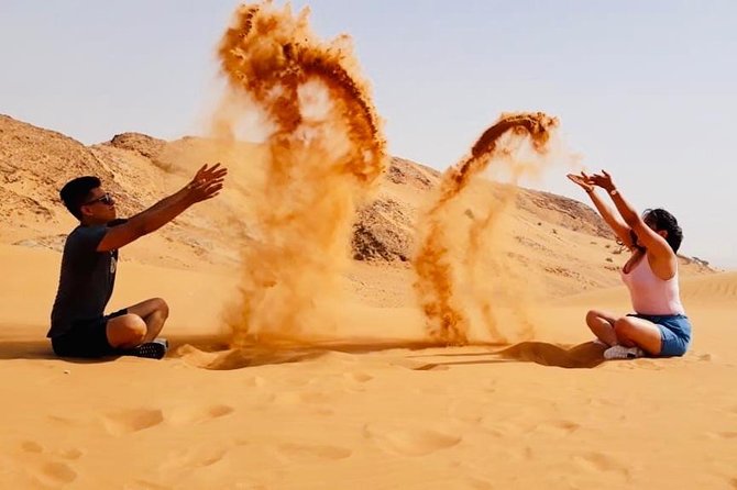 Morning Red Dunes with Camel Ride, Sandboarding and Refreshments - Falcon Photo Opportunities (Winter Only) and Camel Ride Time