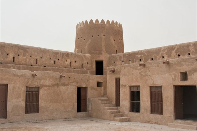 North Qatar Half-Day Tour: Al Zubarah, Purple Island & Mangroves - Al Thakhira Beach: Coastal Life and the Pearson-Fisher Connection