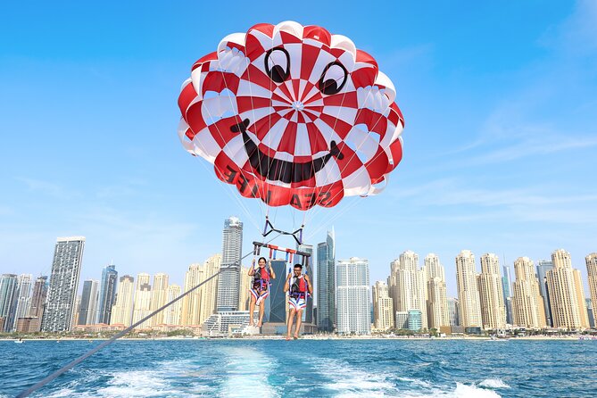 Parasailing in Dubai with Palm Jumeirah and JBR Beach views - In the Air Over 250 Meters: Harness-Up, Then Take in the Big Picture