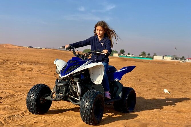 Premium Evening Desert Safari, Quad Bike, Camel & VIP BBQ Dinner - Lahbab dune bashing and sandboarding: the adrenaline portion of the night