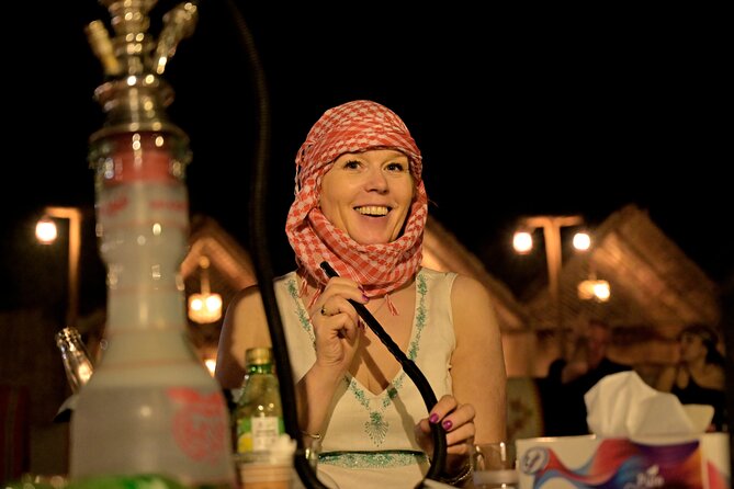 Premium Evening Desert Safari, Quad Bike, Camel & VIP BBQ Dinner - Al Aweer desert camp VIP night: Tanoura, belly dance, and fire with an easy pace