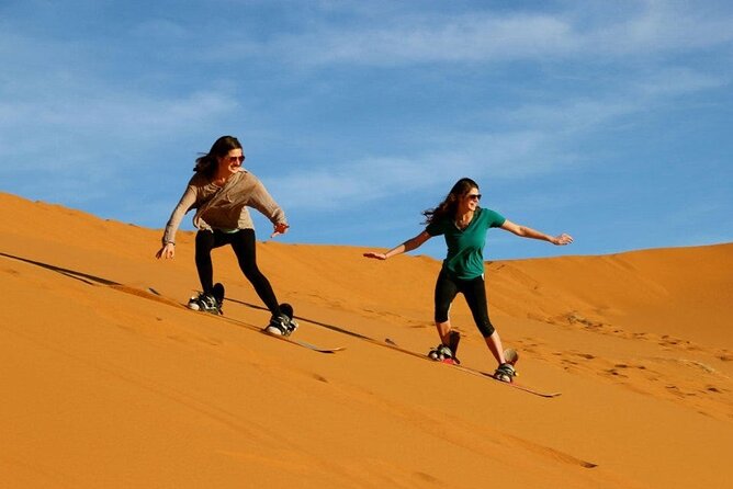 Private Evening Red Sand Desert Safari with BBQ Dinner - BBQ Dinner, Belly Dance, Tanura, and Fire Show