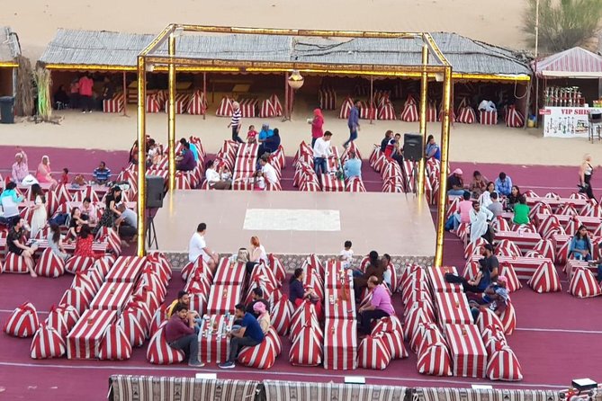 Red Dune Desert Safari with BBQ Dinner, Sand Boarding Dance Shows - Belly Dance, Tanoura, and Fire Dance: The Show Package That Keeps Moving