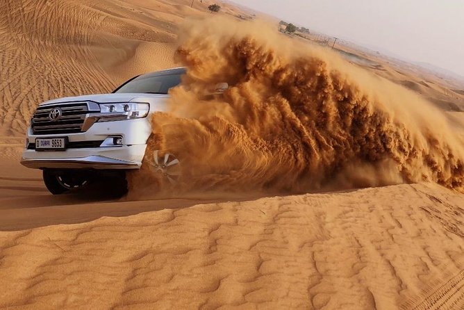 Red Dune Safari Adventure with BBQ Dinner Experience - Sunset on the Sharjah Red Dunes: the photo stop that matters