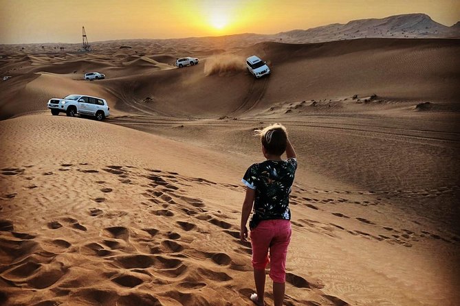 Red Dune Safari Adventure with BBQ Dinner Experience - Desert camp: camels, sand-boarding, henna, and real downtime