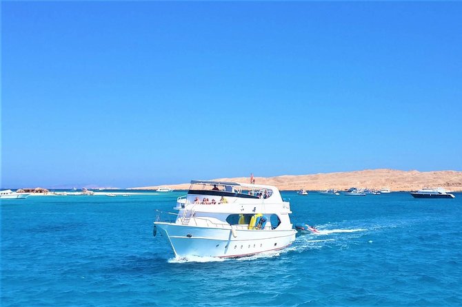 ROYAL Dolphin House & Water Sports Snorkeling Sea Trip - Hurghada - Guided snorkeling that works for beginners (with clear boundaries)
