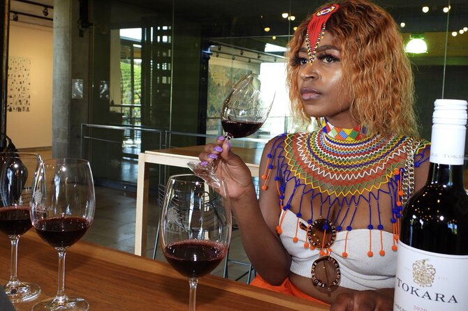 Stellenbosch & Franschhoek 20 Wine Tasting + Lunch Shared Tour - Delheim: lunch pairing on Simonsberg slopes