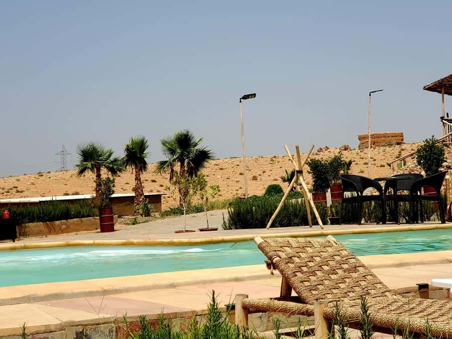 Sunset Camel Ride in Agafay Desert with dinner and pool - Desert pool time: swimming under open-air skies