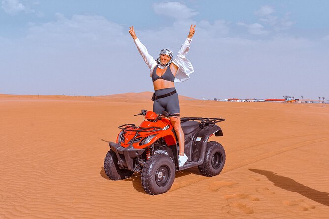 Sunset Desert Safari Quad bike Camel ride Sand Board & BBQ Dinner - Al Lahbab start: quad biking, dune bashing, and sandboarding